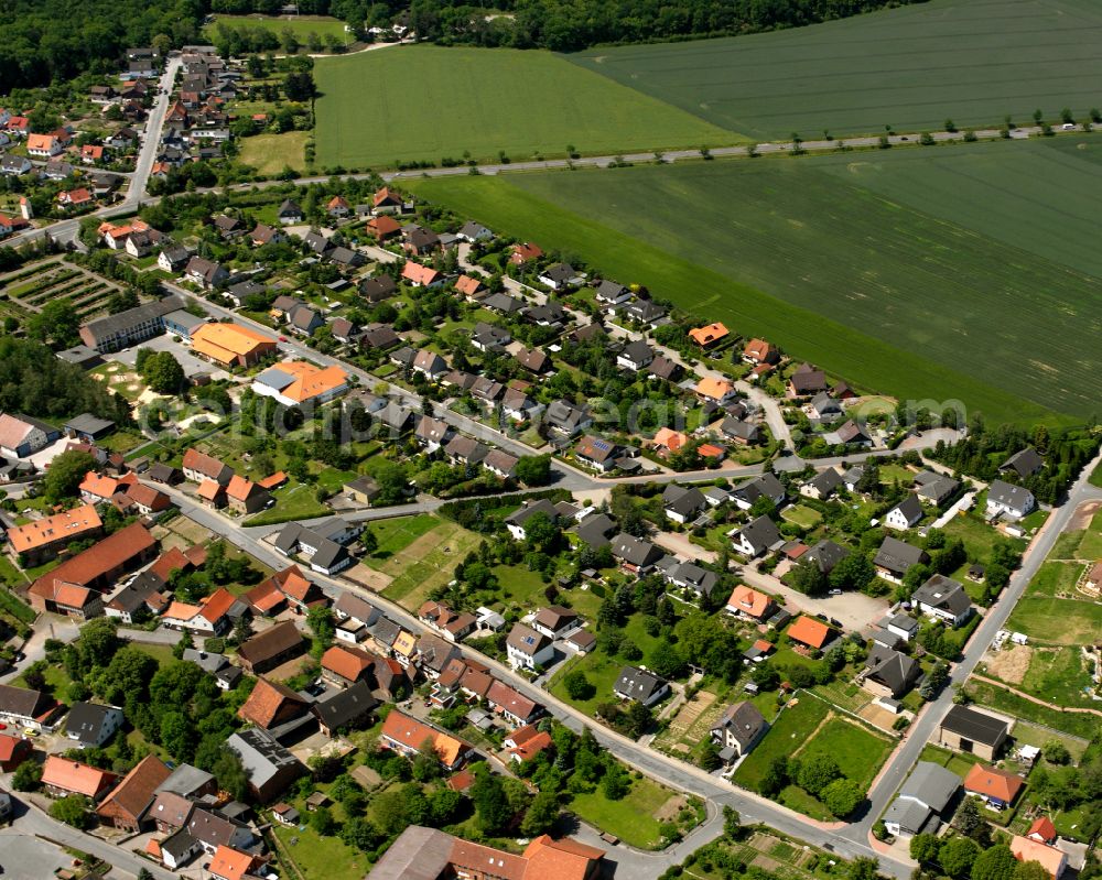 Immenrode from the bird's eye view: Residential area - mixed development of a multi-family housing estate and single-family housing estate in Immenrode in the state Lower Saxony, Germany