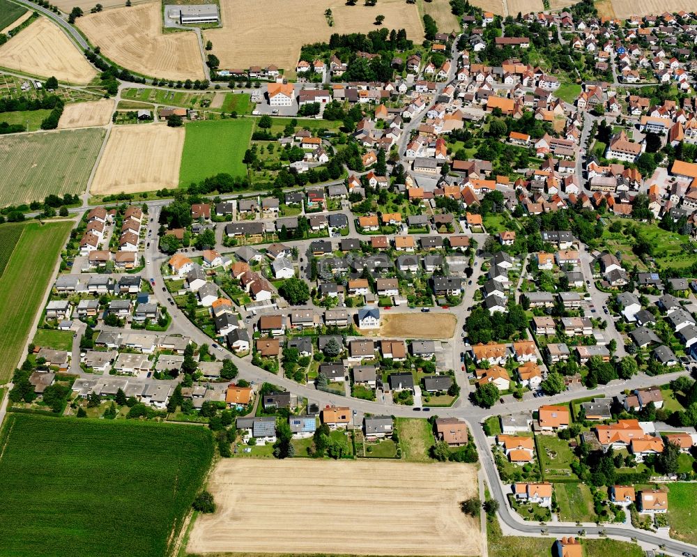 Kirchhausen from the bird's eye view: Residential area - mixed development of a multi-family housing estate and single-family housing estate in Kirchhausen in the state Baden-Wuerttemberg, Germany