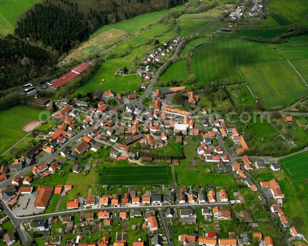 Aerial image Kirchheim - Residential area - mixed development of a multi-family housing estate and single-family housing estate in Kirchheim in the state Hesse, Germany