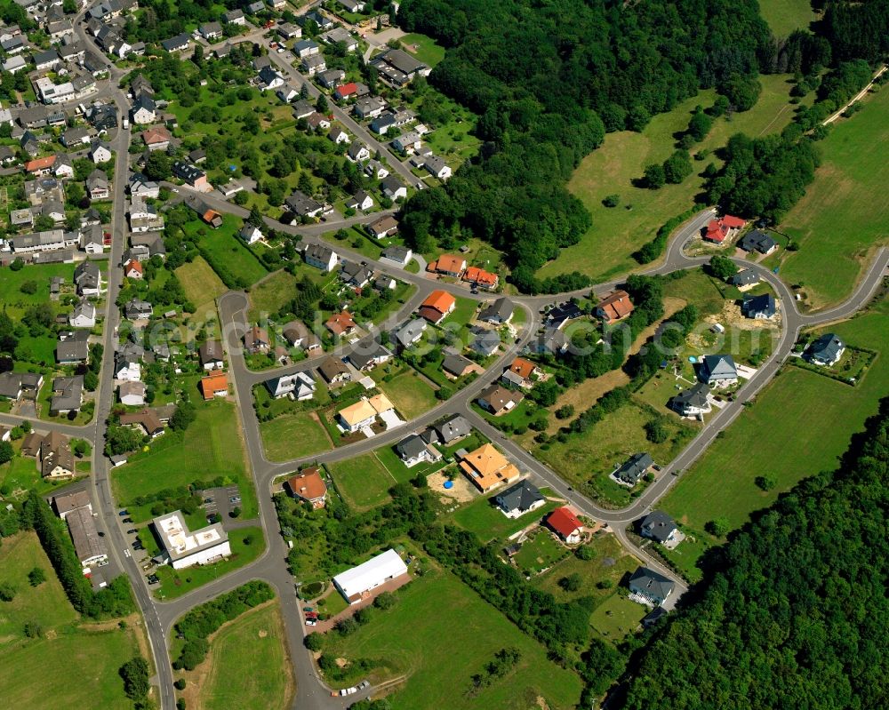 Kirschweiler from the bird's eye view: Residential area - mixed development of a multi-family housing estate and single-family housing estate in Kirschweiler in the state Rhineland-Palatinate, Germany