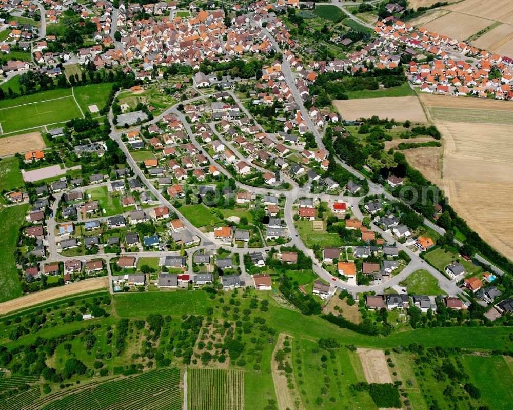 Kleingartach from the bird's eye view: Residential area - mixed development of a multi-family housing estate and single-family housing estate in Kleingartach in the state Baden-Wuerttemberg, Germany