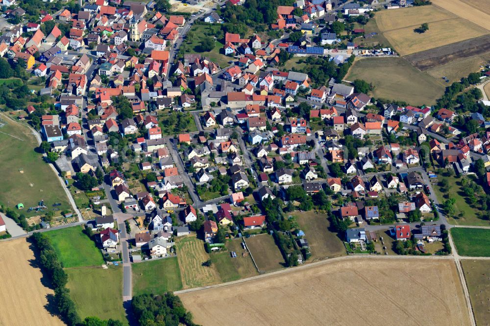 Kleinrinderfeld from above - Residential area - mixed development of a multi-family housing estate and single-family housing estate in Kleinrinderfeld in the state Bavaria, Germany