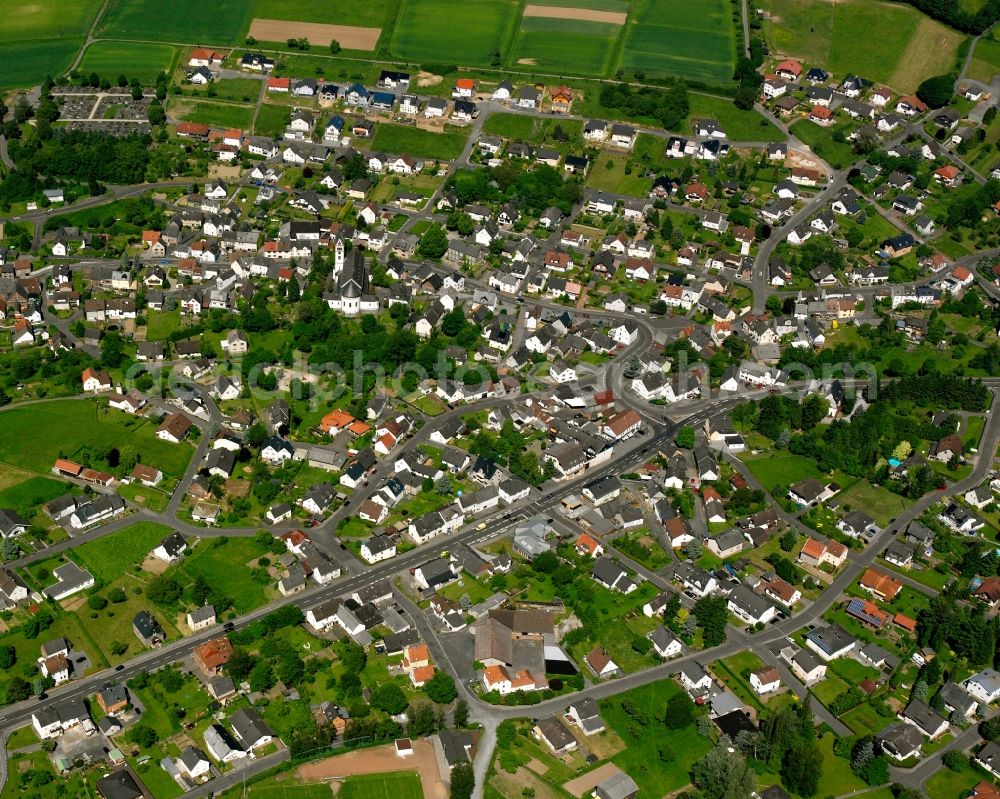 Aerial image Langendernbach - Residential area - mixed development of a multi-family housing estate and single-family housing estate in Langendernbach in the state Hesse, Germany