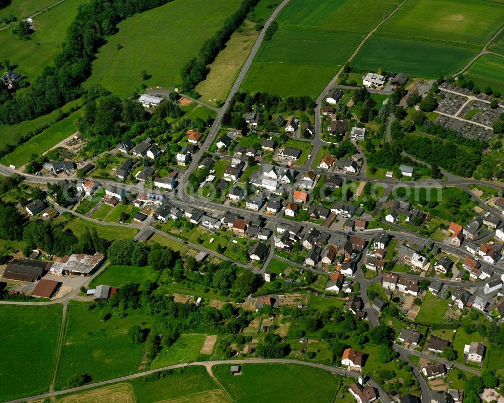 Langendernbach from the bird's eye view: Residential area - mixed development of a multi-family housing estate and single-family housing estate in Langendernbach in the state Hesse, Germany