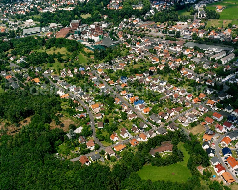 Aerial image Langsdorf - Residential area - mixed development of a multi-family housing estate and single-family housing estate in Langsdorf in the state Hesse, Germany