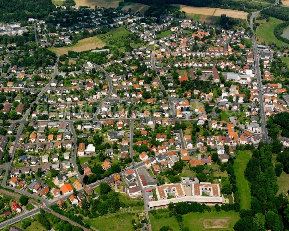 Aerial photograph Langsdorf - Residential area - mixed development of a multi-family housing estate and single-family housing estate in Langsdorf in the state Hesse, Germany