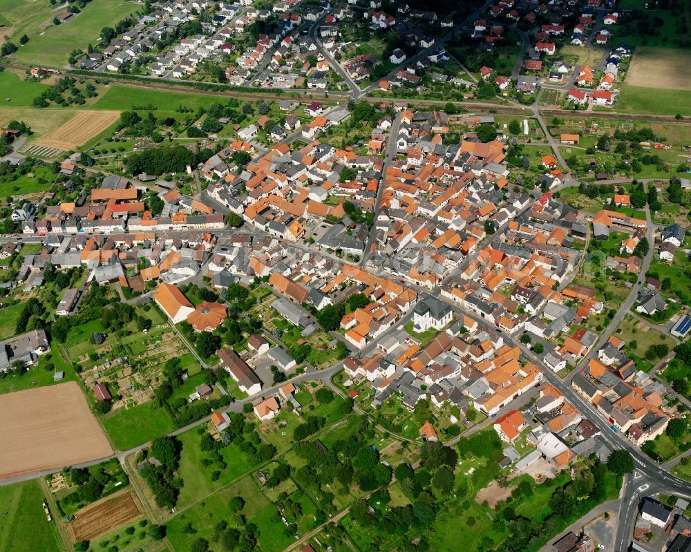 Aerial image Langsdorf - Residential area - mixed development of a multi-family housing estate and single-family housing estate in Langsdorf in the state Hesse, Germany