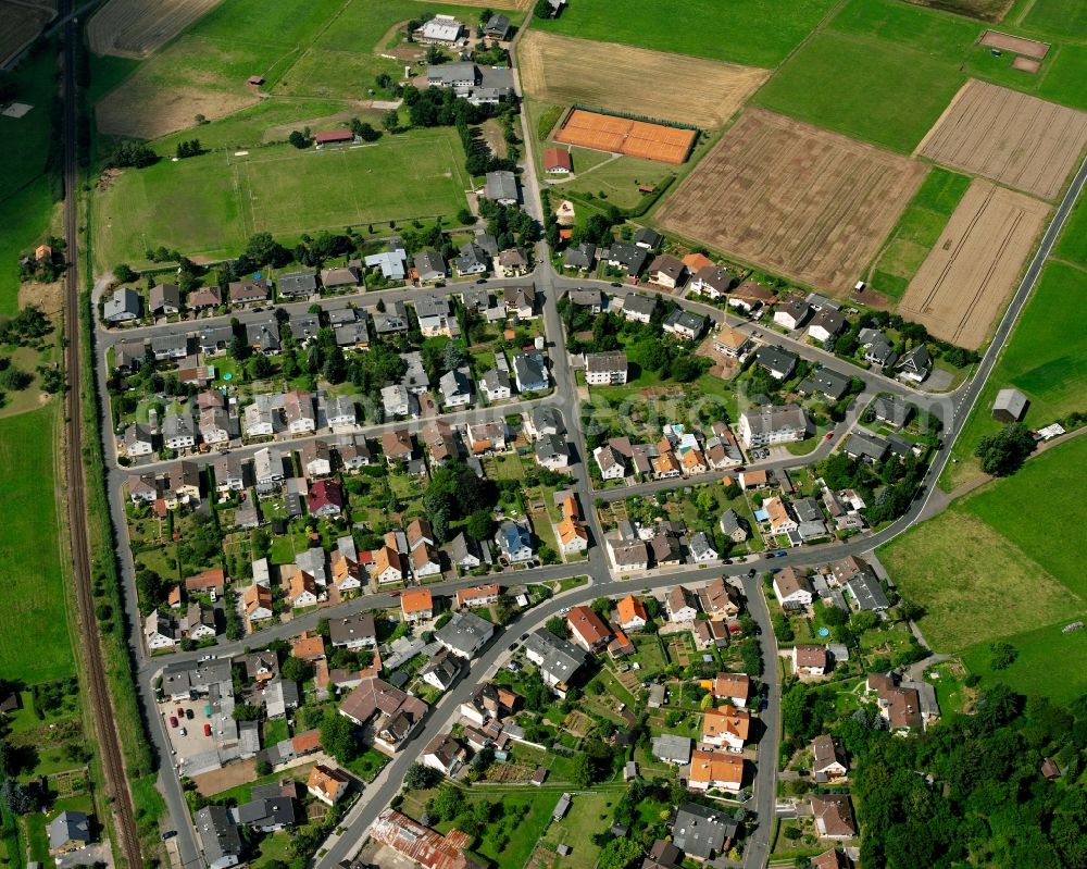 Aerial photograph Langsdorf - Residential area - mixed development of a multi-family housing estate and single-family housing estate in Langsdorf in the state Hesse, Germany