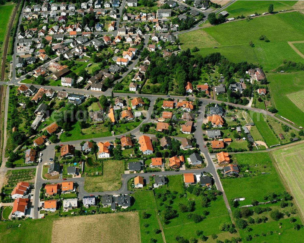 Langsdorf from above - Residential area - mixed development of a multi-family housing estate and single-family housing estate in Langsdorf in the state Hesse, Germany