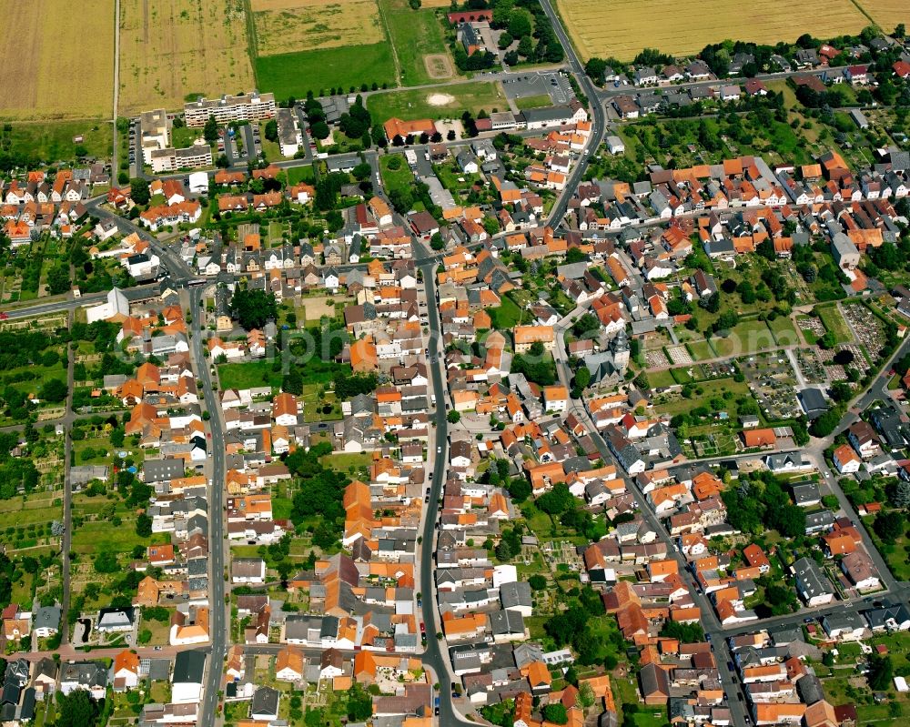 Leihgestern from above - Residential area - mixed development of a multi-family housing estate and single-family housing estate in Leihgestern in the state Hesse, Germany