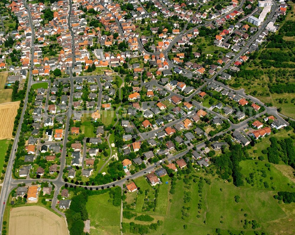 Leihgestern from above - Residential area - mixed development of a multi-family housing estate and single-family housing estate in Leihgestern in the state Hesse, Germany