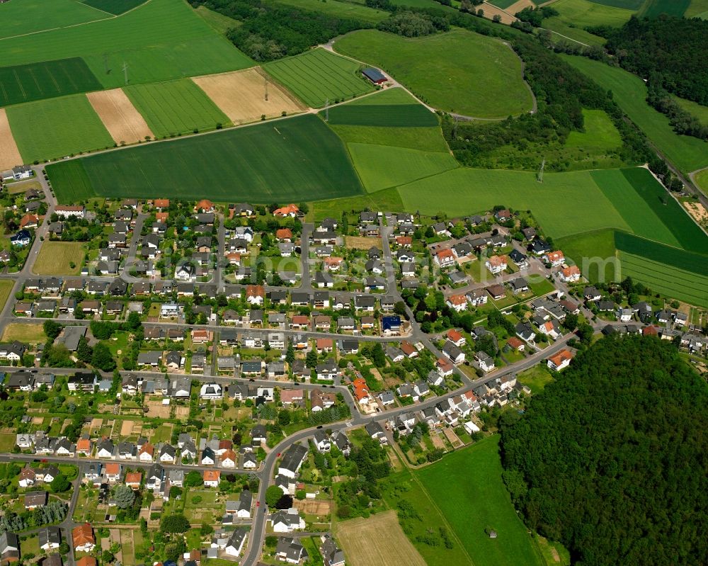 Lindenholzhausen from above - Residential area - mixed development of a multi-family housing estate and single-family housing estate in Lindenholzhausen in the state Hesse, Germany