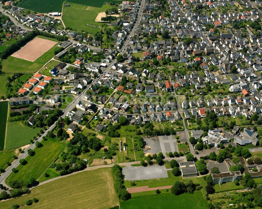 Aerial image Lindenholzhausen - Residential area - mixed development of a multi-family housing estate and single-family housing estate in Lindenholzhausen in the state Hesse, Germany