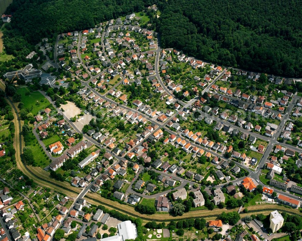 Aerial photograph Lollar - Residential area - mixed development of a multi-family housing estate and single-family housing estate in Lollar in the state Hesse, Germany