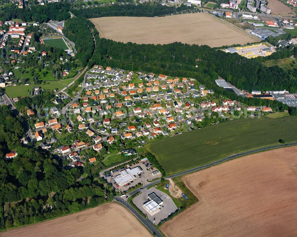 Aerial image Mühlbach - Residential area - mixed development of a multi-family housing estate and single-family housing estate in Mühlbach in the state Saxony, Germany