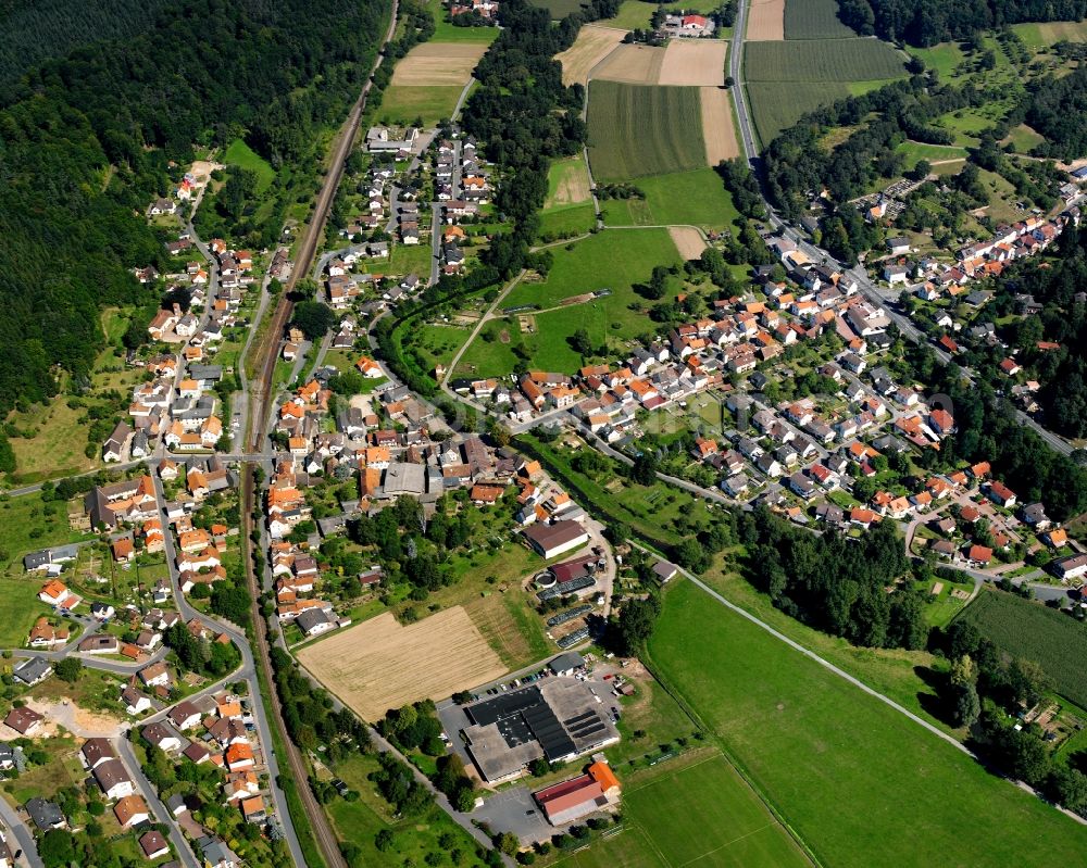 Aerial photograph Mümling-Grumbach - Residential area - mixed development of a multi-family housing estate and single-family housing estate in Mümling-Grumbach in the state Hesse, Germany