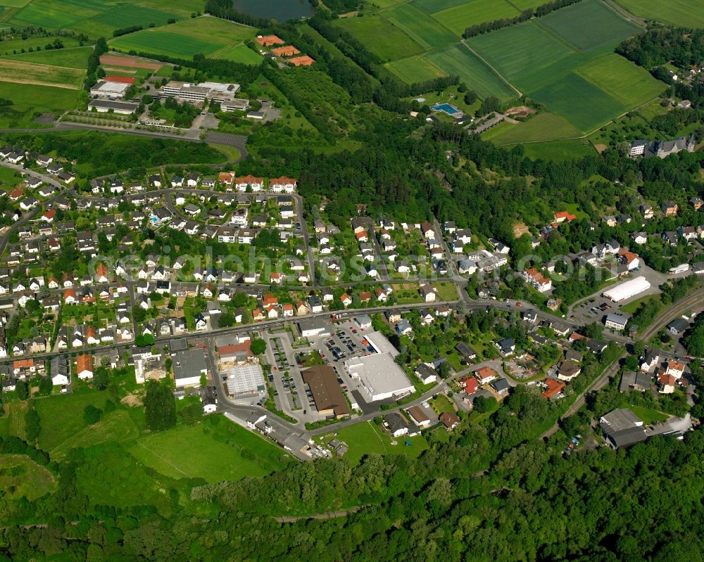 Niederhadamar from above - Residential area - mixed development of a multi-family housing estate and single-family housing estate in Niederhadamar in the state Hesse, Germany