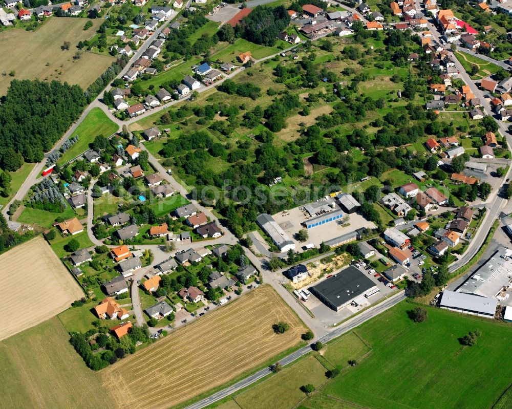 Oberzent from the bird's eye view: Residential area - mixed development of a multi-family housing estate and single-family housing estate in Oberzent in the state Hesse, Germany