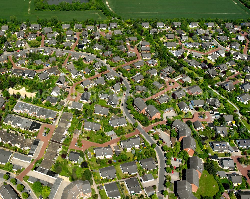 Ohlhof from the bird's eye view: Residential area - mixed development of a multi-family housing estate and single-family housing estate in Ohlhof in the state Lower Saxony, Germany