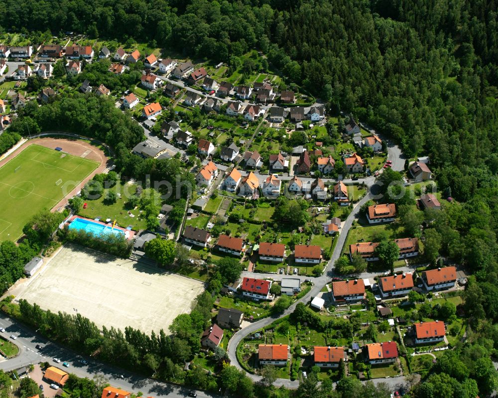 Oker from above - Residential area - mixed development of a multi-family housing estate and single-family housing estate in Oker in the state Lower Saxony, Germany