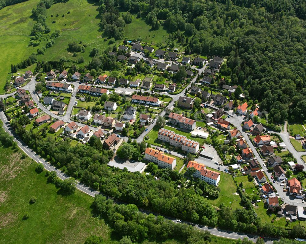 Aerial image Oker - Residential area - mixed development of a multi-family housing estate and single-family housing estate in Oker in the state Lower Saxony, Germany