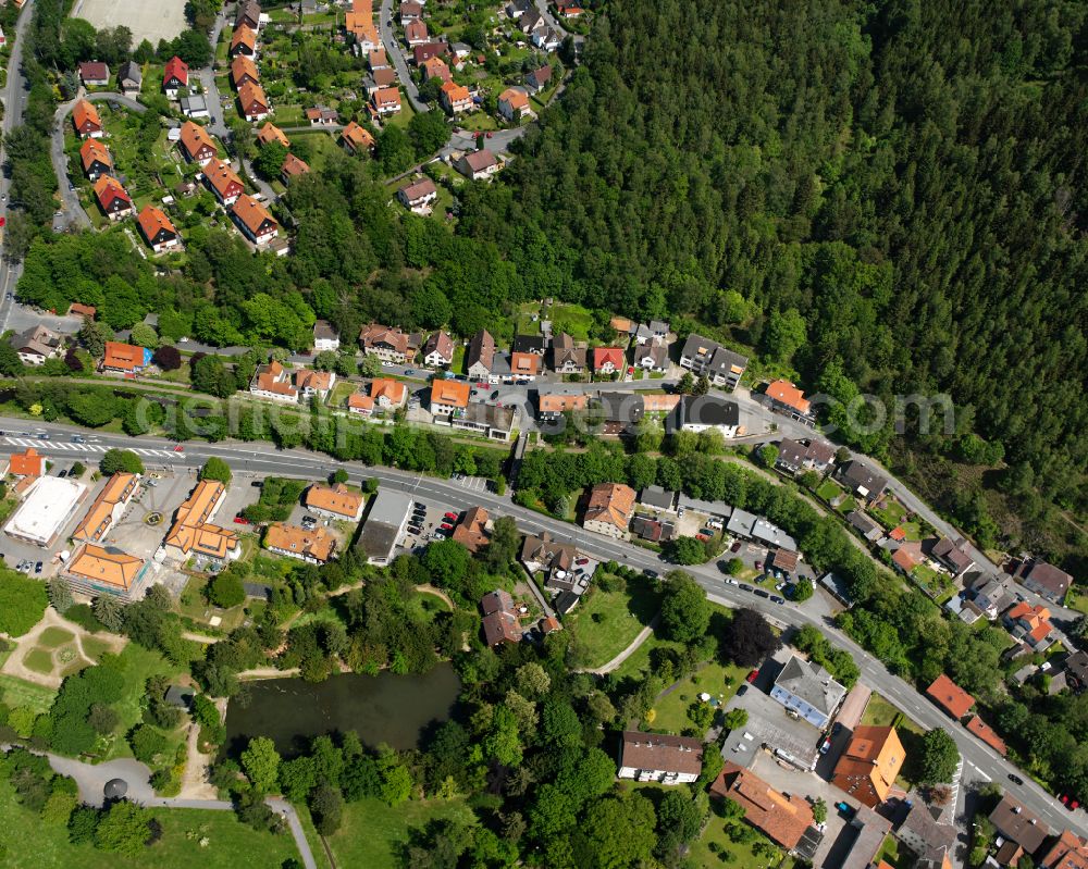 Oker from above - Residential area - mixed development of a multi-family housing estate and single-family housing estate in Oker in the state Lower Saxony, Germany