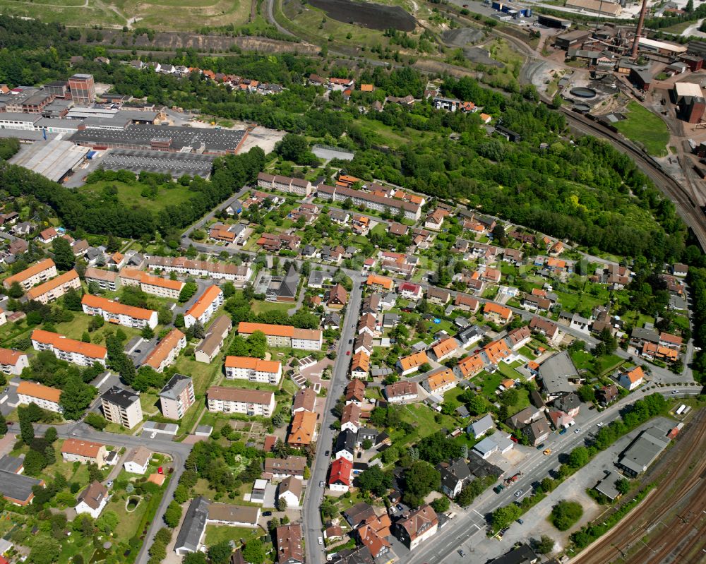 Aerial image Oker - Residential area - mixed development of a multi-family housing estate and single-family housing estate in Oker in the state Lower Saxony, Germany