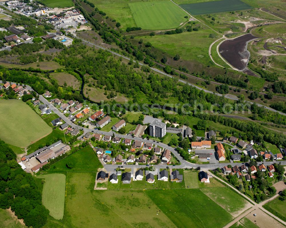 Oker from the bird's eye view: Residential area - mixed development of a multi-family housing estate and single-family housing estate in Oker in the state Lower Saxony, Germany