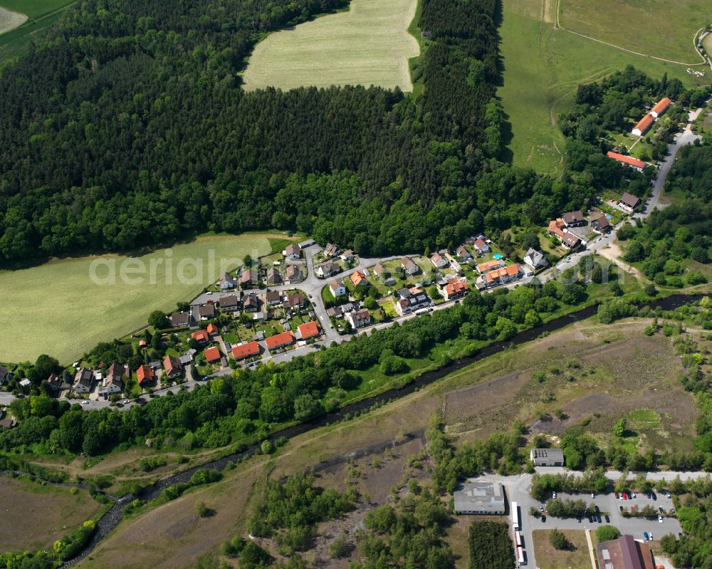 Aerial image Oker - Residential area - mixed development of a multi-family housing estate and single-family housing estate in Oker in the state Lower Saxony, Germany