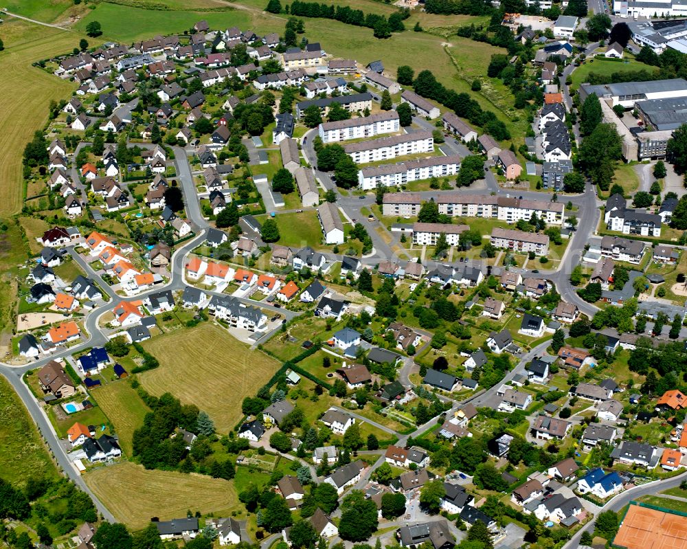 Padberg from the bird's eye view: Residential area - mixed development of a multi-family housing estate and single-family housing estate in Padberg in the state North Rhine-Westphalia, Germany