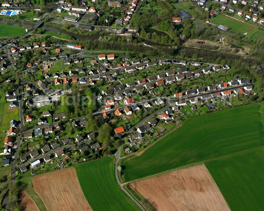 Aerial image Philippsthal (Werra) - Residential area - mixed development of a multi-family housing estate and single-family housing estate in Philippsthal (Werra) in the state Hesse, Germany