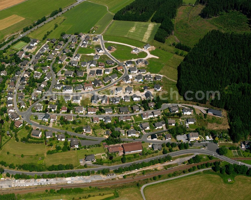 Aerial photograph Raumland - Residential area - mixed development of a multi-family housing estate and single-family housing estate in Raumland in the state North Rhine-Westphalia, Germany