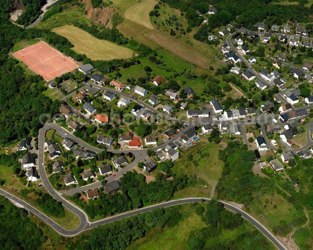 Regulshausen from above - Residential area - mixed development of a multi-family housing estate and single-family housing estate in Regulshausen in the state Rhineland-Palatinate, Germany