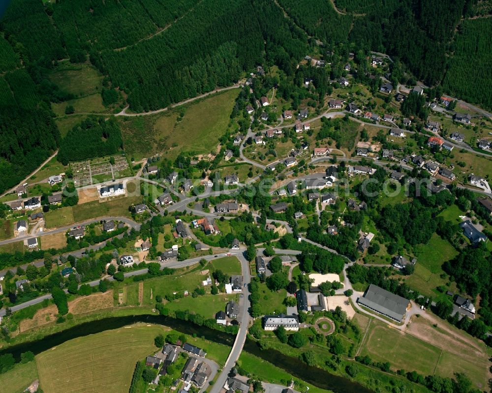 Aerial image Schwarzenau - Residential area - mixed development of a multi-family housing estate and single-family housing estate in Schwarzenau in the state North Rhine-Westphalia, Germany