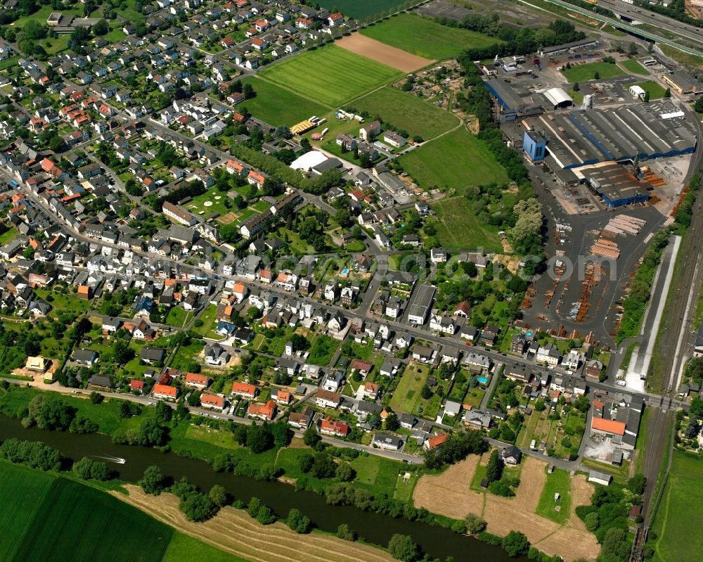 Aerial image Staffel - Residential area - mixed development of a multi-family housing estate and single-family housing estate in Staffel in the state Hesse, Germany