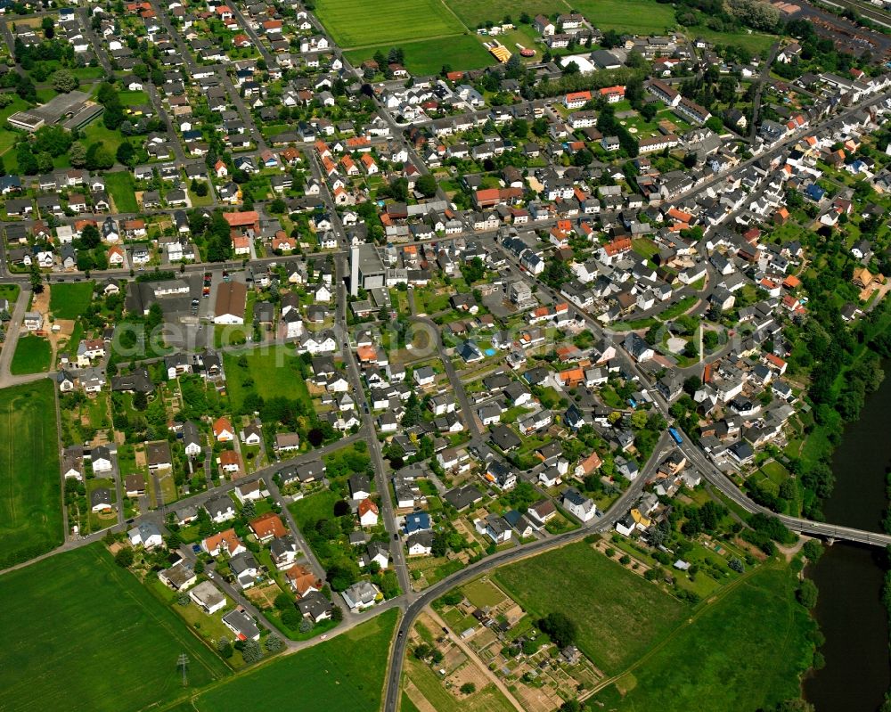 Aerial photograph Staffel - Residential area - mixed development of a multi-family housing estate and single-family housing estate in Staffel in the state Hesse, Germany