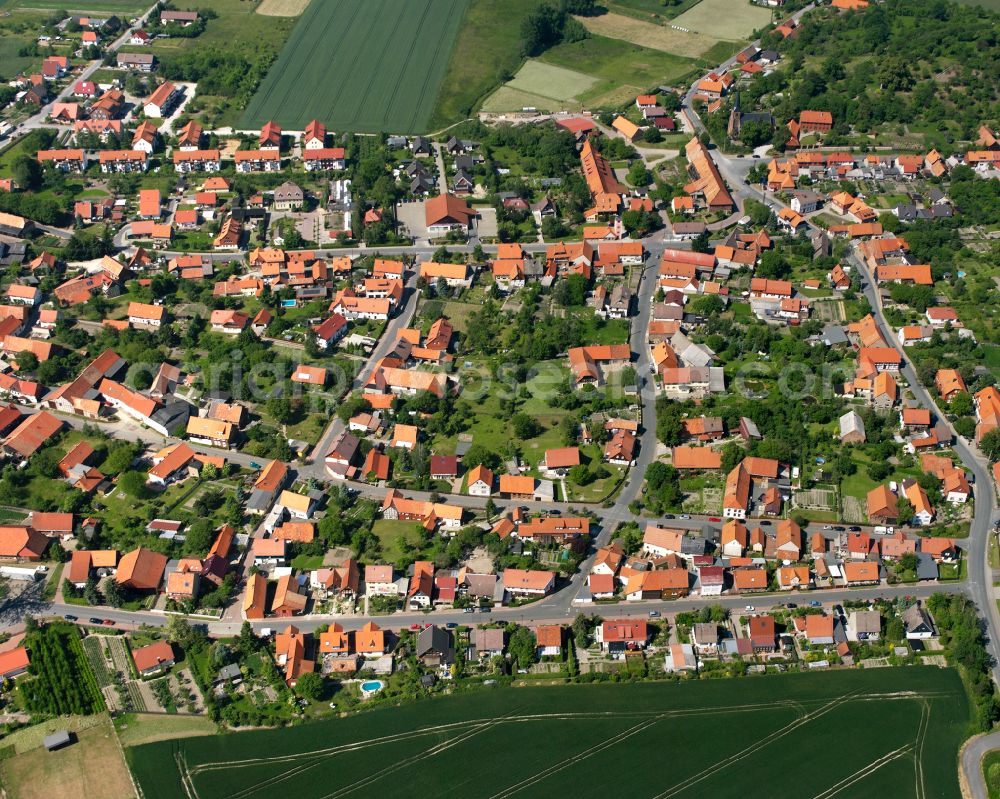 Aerial image Stapelburg - Residential area - mixed development of a multi-family housing estate and single-family housing estate in Stapelburg in the state Saxony-Anhalt, Germany