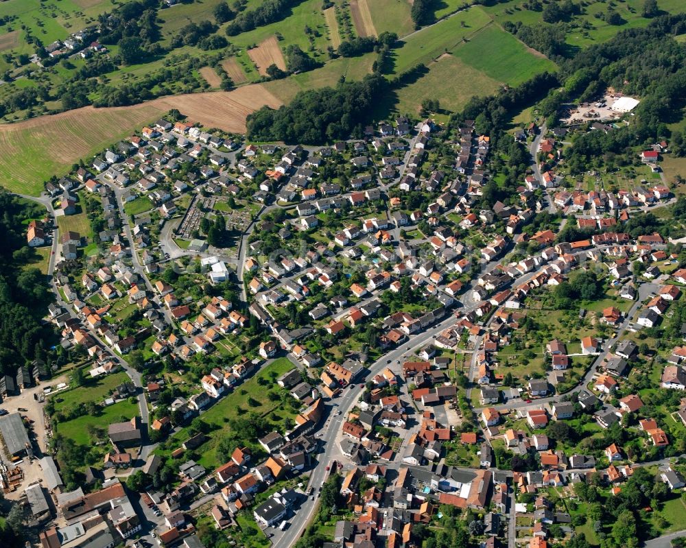 Aerial image Steinbach - Residential area - mixed development of a multi-family housing estate and single-family housing estate in Steinbach in the state Hesse, Germany