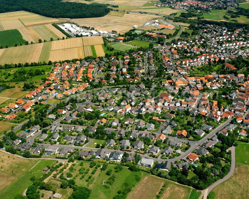 Aerial image Steinbach - Residential area - mixed development of a multi-family housing estate and single-family housing estate in Steinbach in the state Hesse, Germany