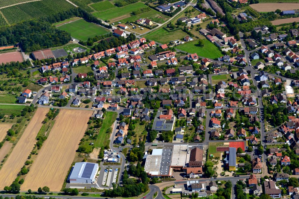 Thüngersheim from the bird's eye view: Residential area - mixed development of a multi-family housing estate and single-family housing estate in Thüngersheim in the state Bavaria, Germany