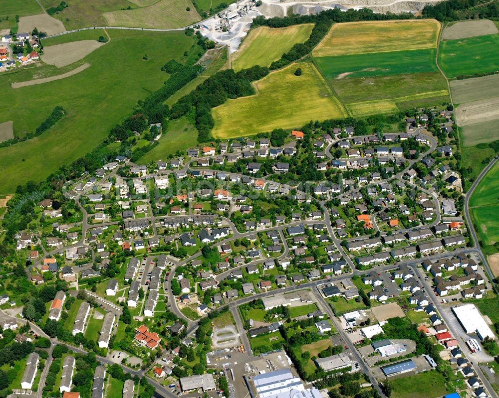 Birkenfeld from above - Residential area - mixed development of a multi-family housing estate and single-family housing estate Im Vogelsang in Birkenfeld in the state Rhineland-Palatinate, Germany