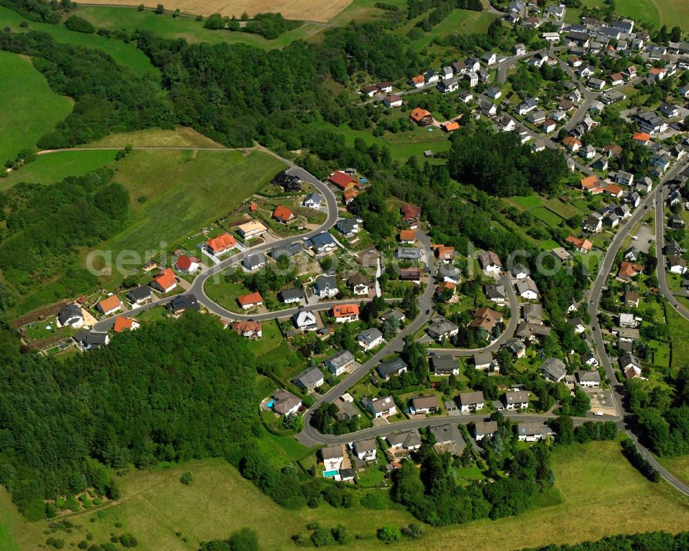 Vollmersbach from the bird's eye view: Residential area - mixed development of a multi-family housing estate and single-family housing estate in Vollmersbach in the state Rhineland-Palatinate, Germany