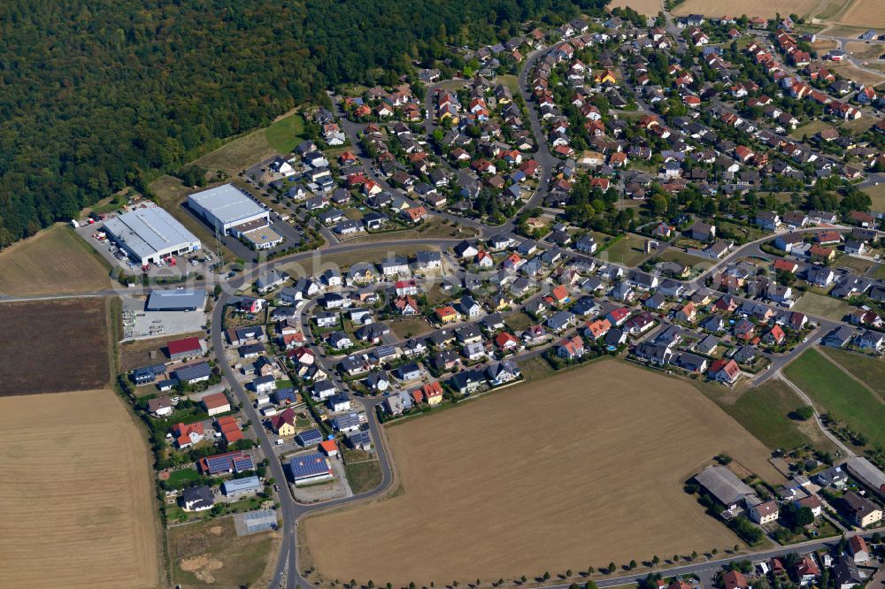 Waldbrunn from the bird's eye view: Residential area - mixed development of a multi-family housing estate and single-family housing estate in Waldbrunn in the state Bavaria, Germany