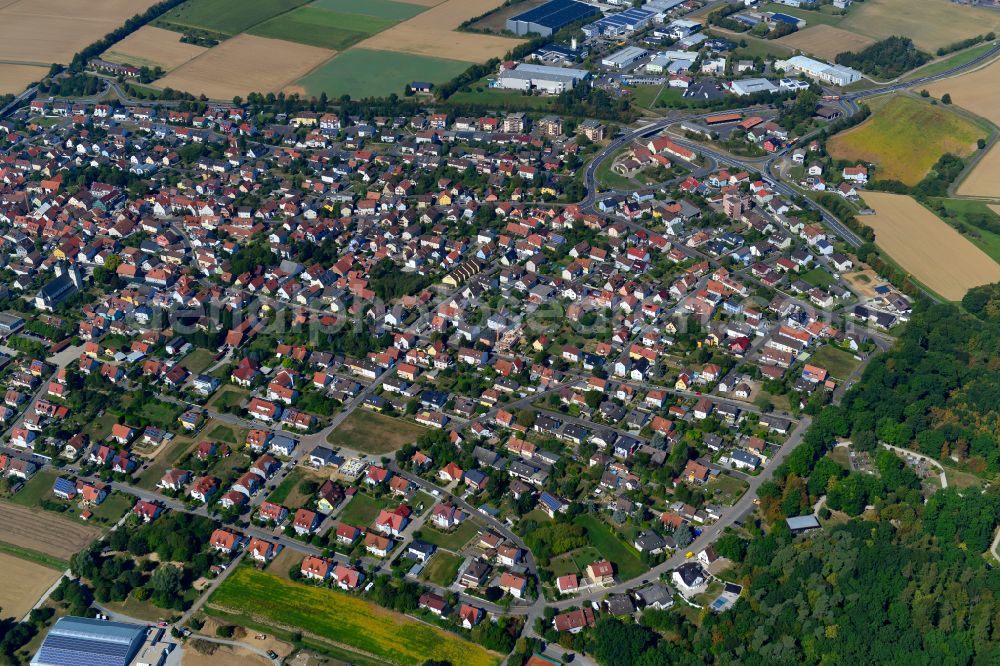 Aerial image Waldbüttelbrunn - Residential area - mixed development of a multi-family housing estate and single-family housing estate in Waldbüttelbrunn in the state Bavaria, Germany