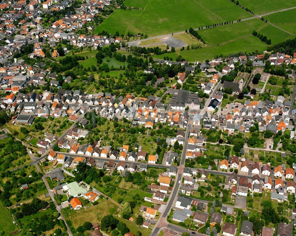 Watzenborn-Steinberg from the bird's eye view: Residential area - mixed development of a multi-family housing estate and single-family housing estate in Watzenborn-Steinberg in the state Hesse, Germany