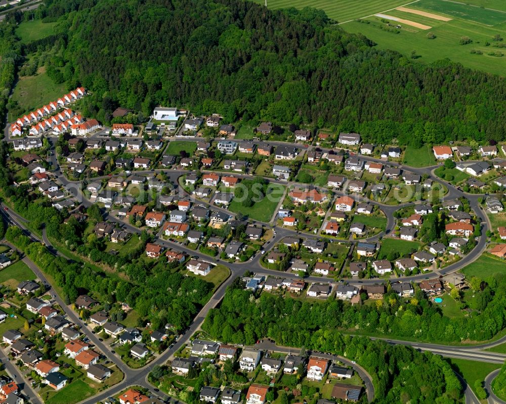 Aerial image Montabaur - Residential area in Montabaur in the state Rhineland-Palatinate. The official tourist resort is the seat of administration of the county district of Westerwald. The town is an economic centre of the region and know for its castle and train station