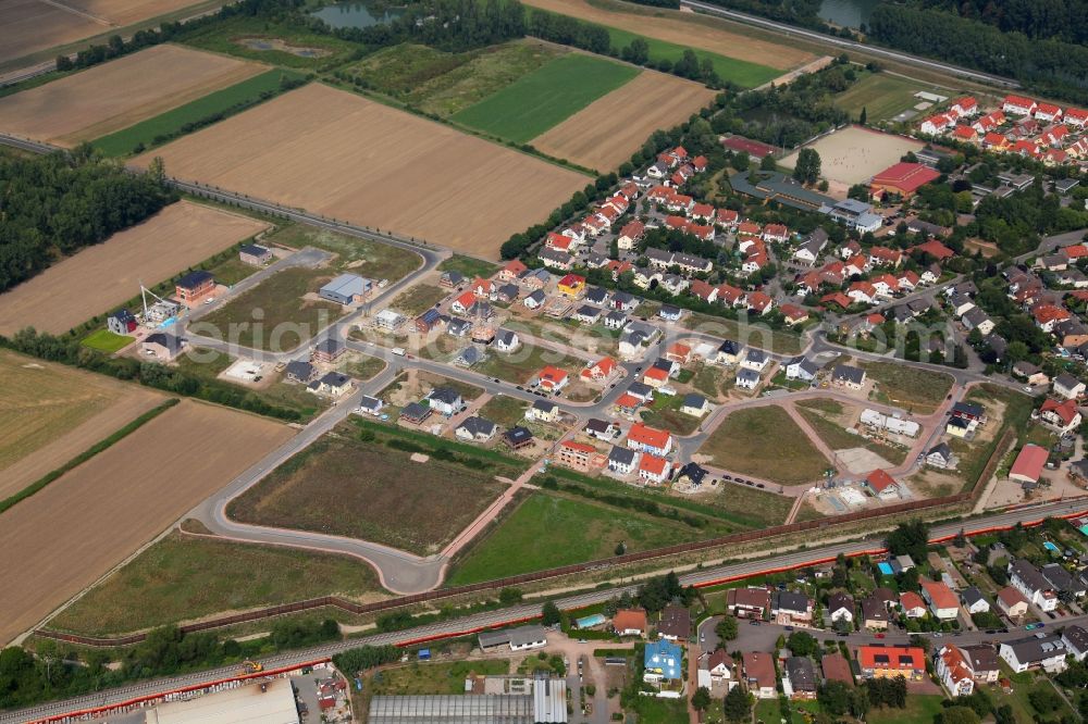 Aerial image Nackenheim - Residential area with surrounding field landscape along the Karl-Arand-Strasse. Family homes and construction sites of other houses in Nackenheim in the state of Rhineland-Palatinate