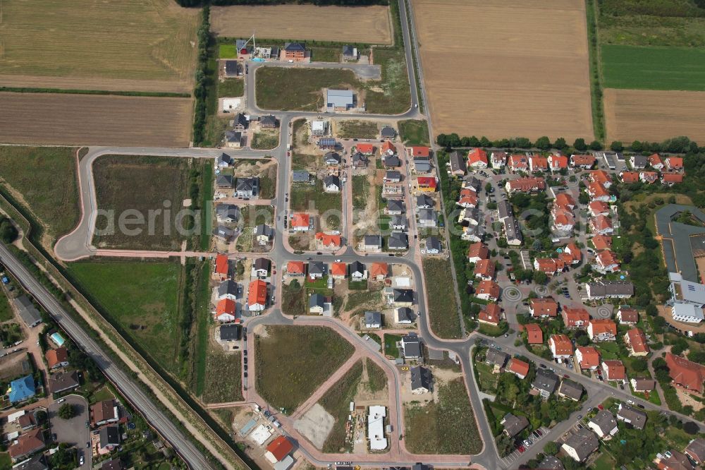 Aerial image Nackenheim - Residential area with surrounding field landscape along the Karl-Arand-Strasse. Family homes and construction sites of other houses in Nackenheim in the state of Rhineland-Palatinate