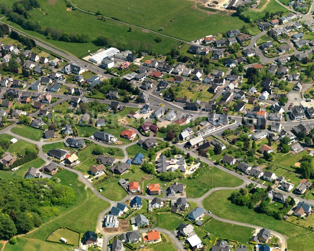 Aerial image Rennerod - Residential area in the North of the town centre of Rennerod in the state of Rhineland-Palatinate. The town is located in the Westerwald region and county district on federal highway B54. It is surrounded by industrial areas, agricultural fields and meadows