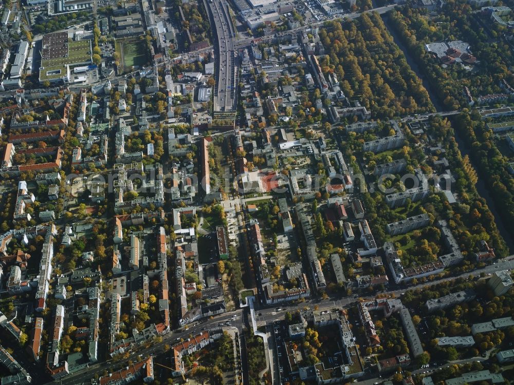 Berlin from the bird's eye view: Residential area with the tunnel exit of federal motorway A100 in the area of Buschkrugallee in the Neukoelln part of Berlin in Germany. The lower edge of the immage shows Britzer Damm - on the Western edge of Carl-Weder park. Teltow canal takes its course in the South of the area